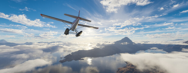 Airplane flying over mountains, lakes, and clouds. Sunny Da