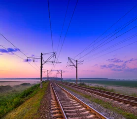 Schilderijen op glas Dawn's Awakening: A Serene Journey Along the Railway Tracks © maykal