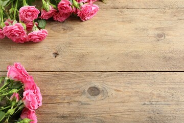 Happy Mother's Day. Beautiful flowers on wooden table, space for text