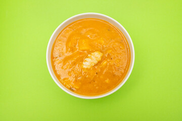 Creamy fish soup in bowl. Top view.