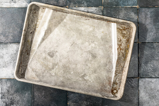 Overhead of wax paper on old baking sheet