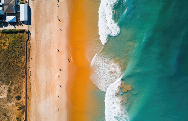 Fototapeta na wymiar Beach and waves from top aerial view. Turquoise water background from top view. Summer seascape from air. Top view from drone. Travel concept and idea