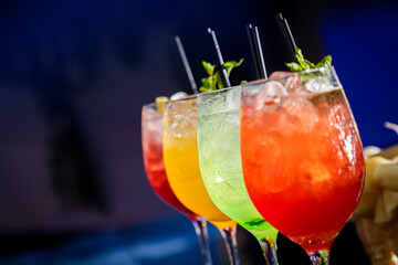 many colourful frozen cocktails smoothies