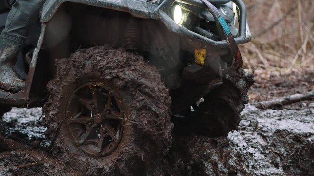 quads moving trough the mud, off road trial. High quality 4k footage