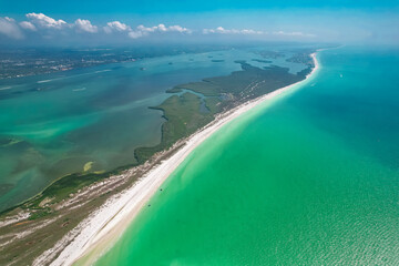 Florida. Beach on Island. Panorama of Clearwater Beach Florida. Caladesi Island State Park FL. Summer vacation. Turquoise color of salt water. Ocean or Gulf of Mexico. Tropical Nature. Aerial Aerial - obrazy, fototapety, plakaty