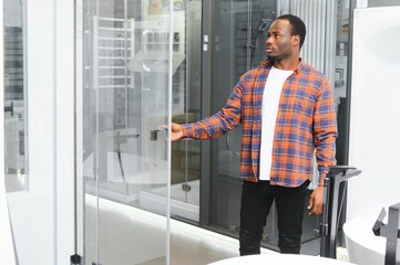 Young african american man choosing a bath