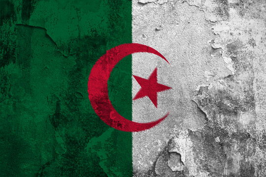 People's Democratic Republic of Algeria Flag Cracked Concrete Wall Textured Background