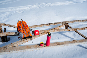 Equipment for hiking in the cold season, winter travel, trekking alone in the forest, thermos with...