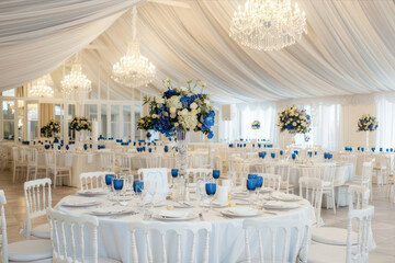 wedding hall with white tables and chairs, blue decorations. AI Generated