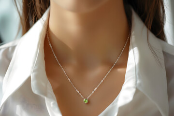 neutral peridot and minimalist silver chain necklace that is easy to match and looks cool around a neck 