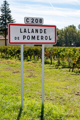 City road sign Lalande de Pomerol near Saint-Emilion wine making region, growing of Merlot or...