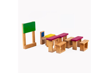 Wooden toys for kids, School benches and chairs in tiny Wooden Blocks toy pieces isolated in white background | Educational toys for preschool and kindergarten children.