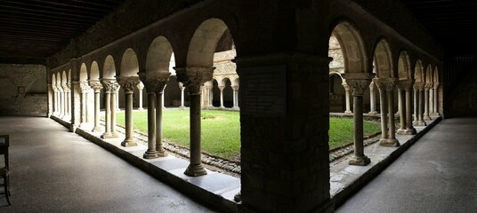 Panoramic view of the Romanesque cloister of the Saint-Lizier cathedral. XII century. Semicircular...