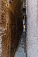 The most narrow alley Calle Varisco in Venice, Veneto, Italy