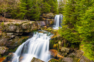 View of a beautiful waterfall in a mountain valley