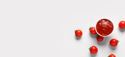 Bowl with tomato paste and fresh vegetables on white background - obrazy, fototapety, plakaty