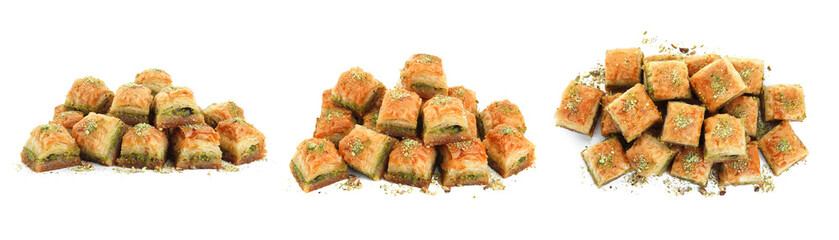 Eastern sweets. Pieces of delicious fresh baklava with chopped nuts isolated on white, set