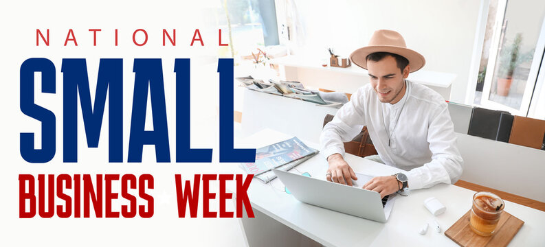 Handsome young man working with laptop in cafe - Powered by Adobe