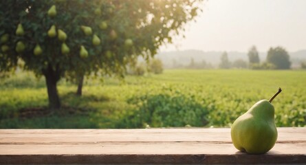 Pear fruits on wooden table, field garden in background. - 769084029