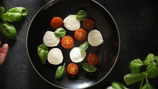 mozzarella salad caprese tomato, basil fresh food tasty eating appetizer meal food snack on the table copy space food background 