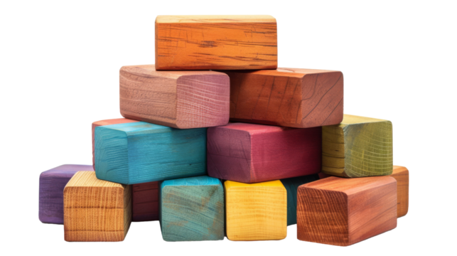 Wooden blocks stacked into a precarious tower, reaching for the sky