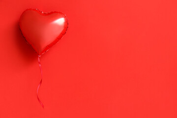 Heart shaped air balloon on red background. Valentine's day celebration