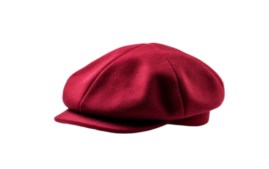 A solitary red hat sits elegantly on a pristine white background