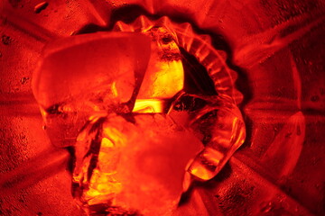 ice cubes in glass with Red LED lighting 