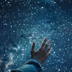 Captivating image of a hand reaching towards stars in a starry night, symbolizing professional aspirations. Perfect for career coaching materials, motivational content, and self-help articles