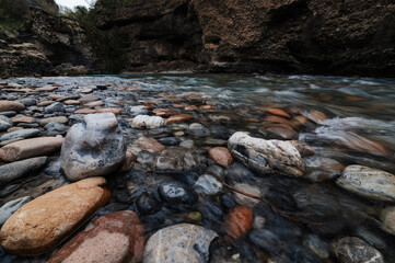 stones in a mountain river in the mountains in the Aksu canyon in Kazakhstan