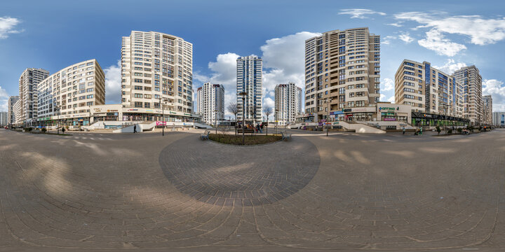 MINSK, BELARUS - MARCH 26, 2024: hdri panorama 360 near skyscraper multistory buildings of residential quarter complex in full equirectangular seamless spherical projection
