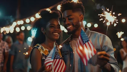 Fotobehang African American couple celebrating Independence Day together in the United States © Alejandro Morón