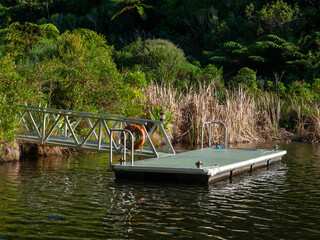 Small Jetty At The Edge Of A Lake