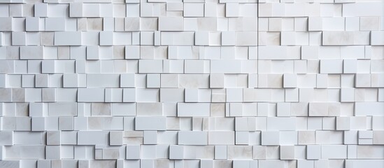 Detailed view of a white wall featuring an abundance of square shapes in various sizes and shades