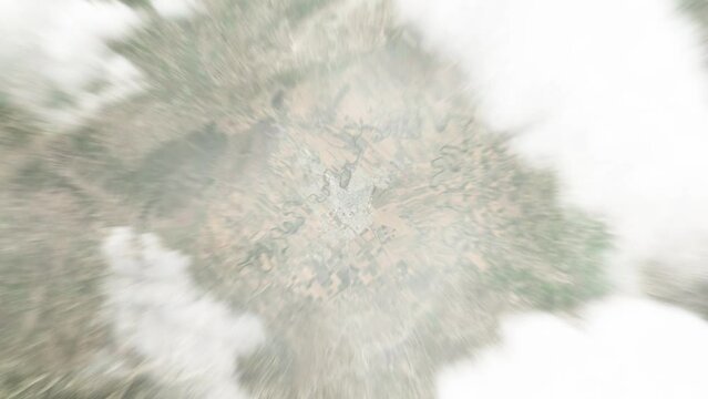 Earth zoom in from space to Jendouba, Tunisia. Followed by zoom out through clouds and atmosphere into space. Satellite view. Travel intro. Images from NASA