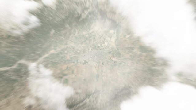 Earth zoom in from space to Sidi Bouzid, Tunisia. Followed by zoom out through clouds and atmosphere into space. Satellite view. Travel intro. Images from NASA