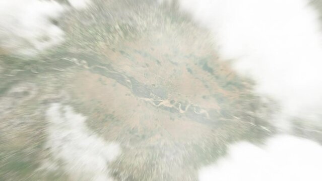 Earth zoom in from space to Ati, Chad. Followed by zoom out through clouds and atmosphere into space. Satellite view. Travel intro. Images from NASA