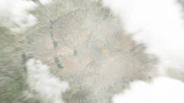Earth zoom in from space to Zinder, Niger. Followed by zoom out through clouds and atmosphere into space. Satellite view. Travel intro. Images from NASA