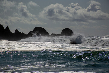  Crashing Waves and Jagged Rocks