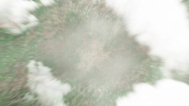 Earth zoom in from space to Mamou, Guinea. Followed by zoom out through clouds and atmosphere into space. Satellite view. Travel intro. Images from NASA