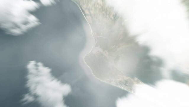 Earth zoom in from space to Robertsport, Liberia. Followed by zoom out through clouds and atmosphere into space. Satellite view. Travel intro. Images from NASA