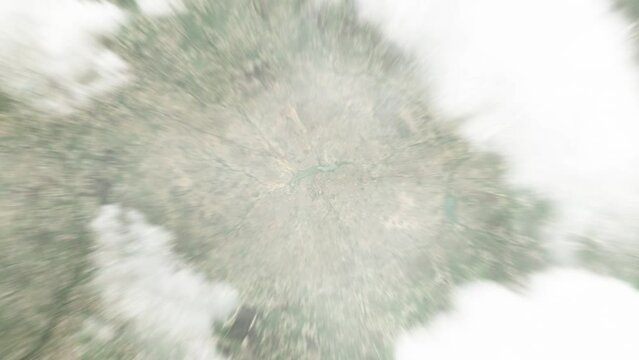 Earth zoom in from space to Fada N'gourma, Burkina Faso. Followed by zoom out through clouds and atmosphere into space. Satellite view. Travel intro. Images from NASA