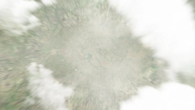 Earth zoom in from space to Parakou, Benin. Followed by zoom out through clouds and atmosphere into space. Satellite view. Travel intro. Images from NASA