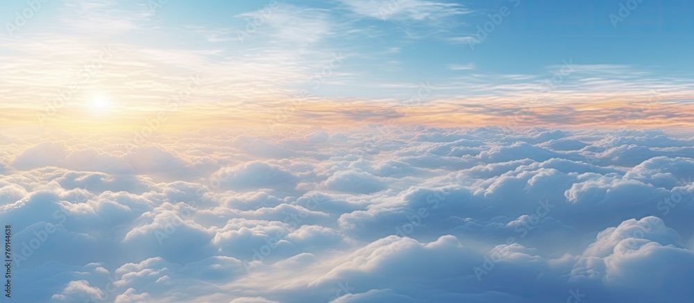 Poster the suns rays are breaking through the clouds in the sky, creating a stunning natural landscape duri