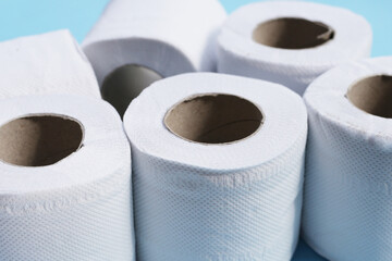Toilet paper on blue background.
