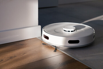 A white robot vacuum cleaner cleans tiles and wooden floors. collects dust and washes the floor....
