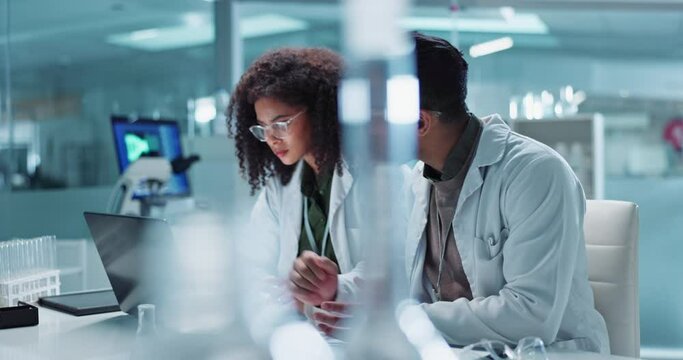 Science, teamwork and scientist with laptop in laboratory for communication, pharmaceutical review or planning. Employees, collaboration and technology for research, discussion and digital analysis