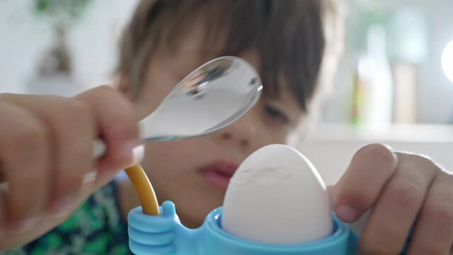 Breakfast Fun - Young Boy Cracking Egg In His Beloved Kid-Friendly Egg Holder