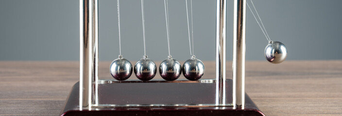 Harmony in Motion: Newton's Cradle Demonstrates the Beauty of Physics