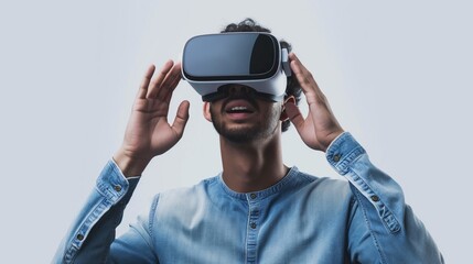 Young man wearing vr glasses, experience virtual reality video games with virtual reality headset, trying to touch or grab something with hand, copy space.